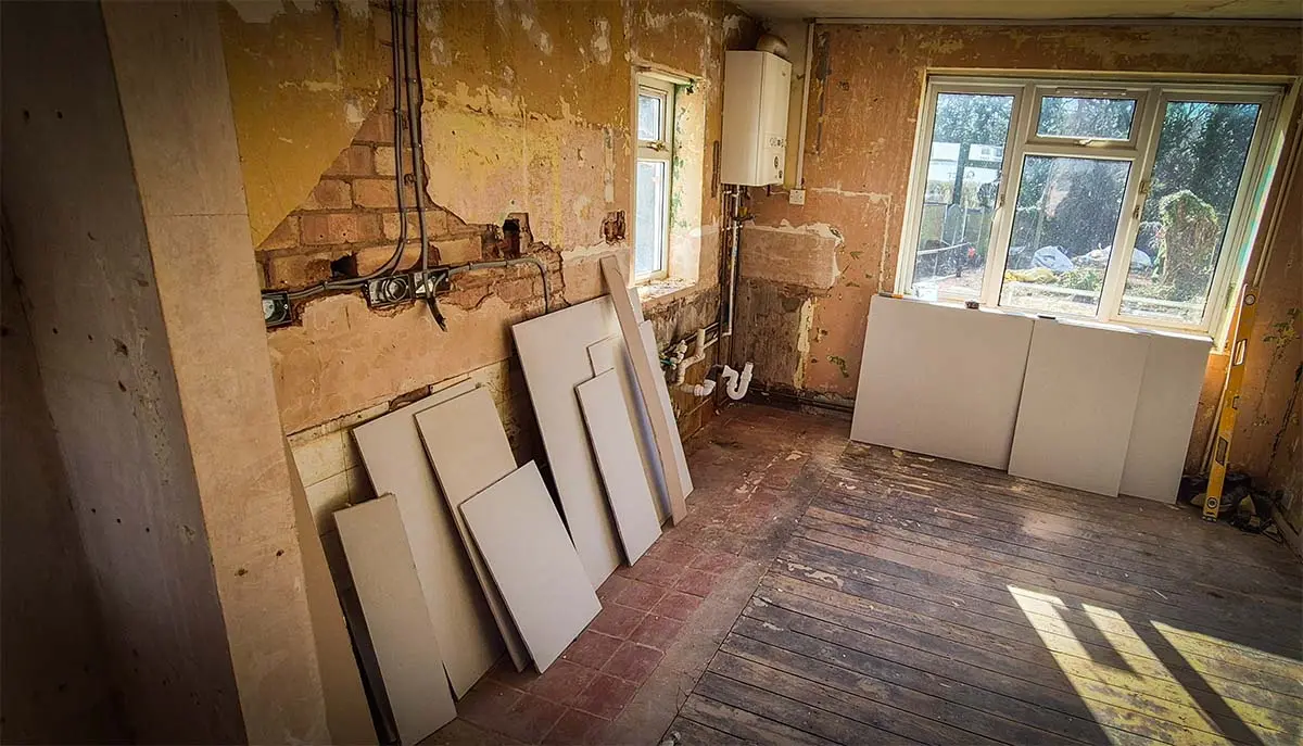 Kitchen stripped back to brick and ready for plasterboarding during void works